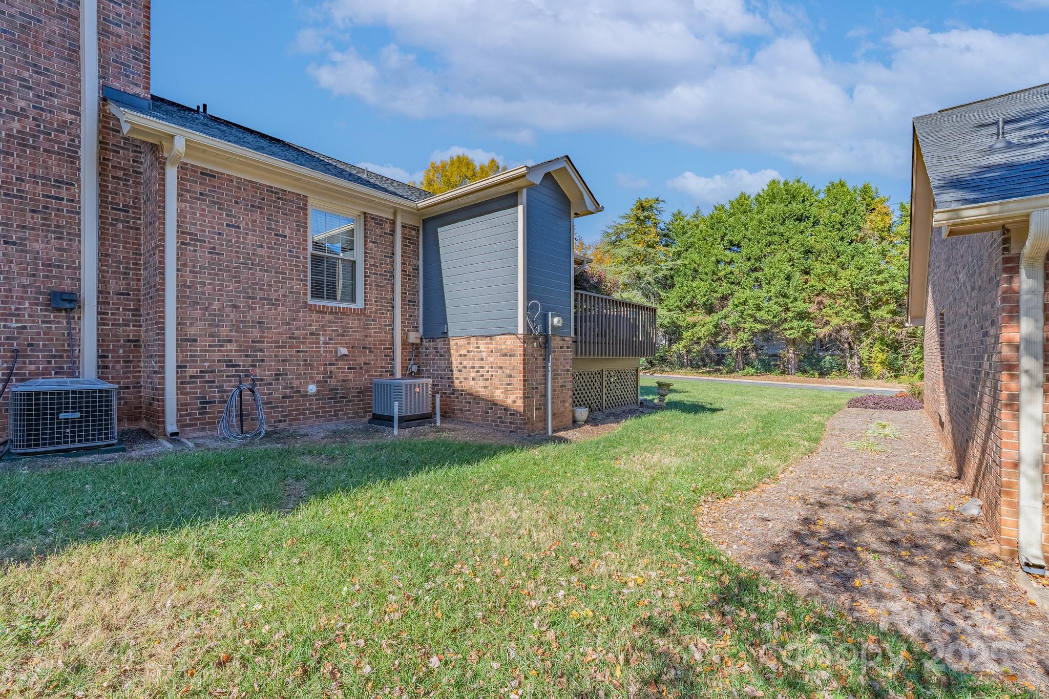 201 Pointe Circle Rock Hill, SC 29732 - Photo 28 of 32 a front view of a house with garden