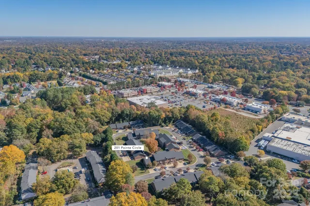 an aerial view of a city with lots of residential buildings