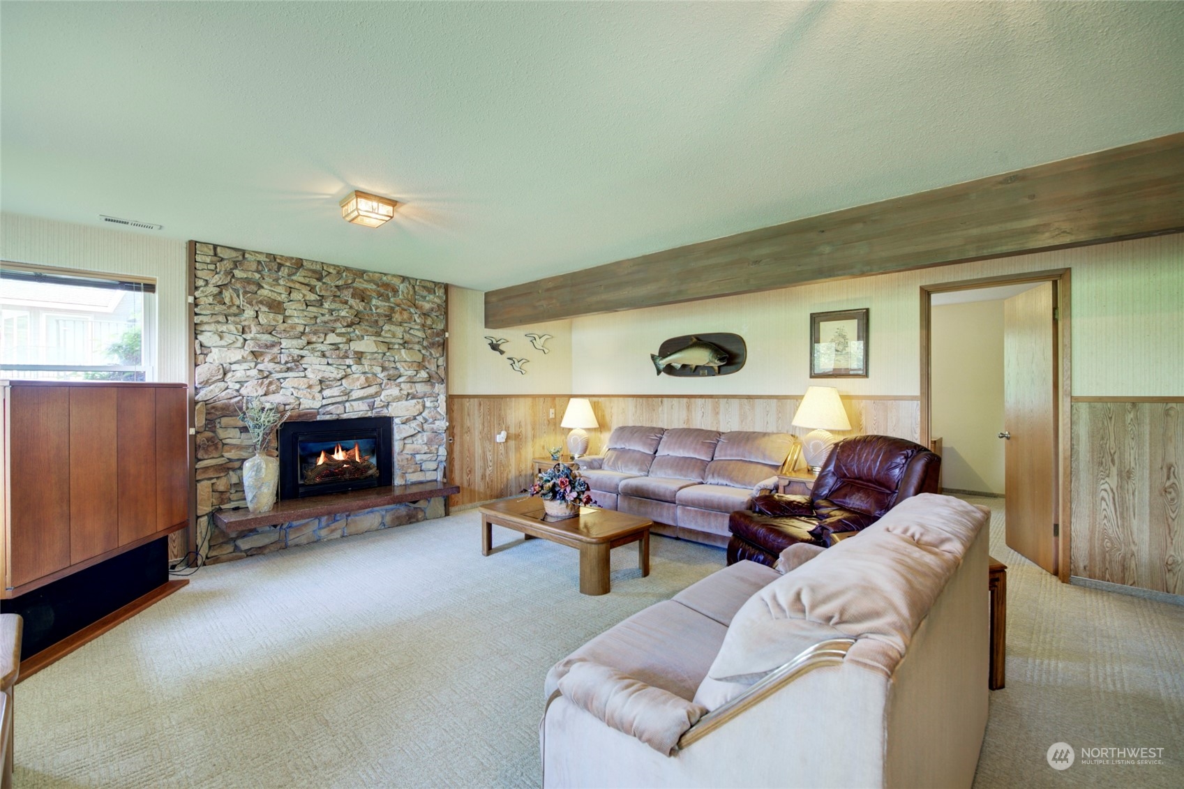 432 Olympic Avenue Edmonds, WA 98020 - Photo 21 of 34 a living room with furniture and a fireplace