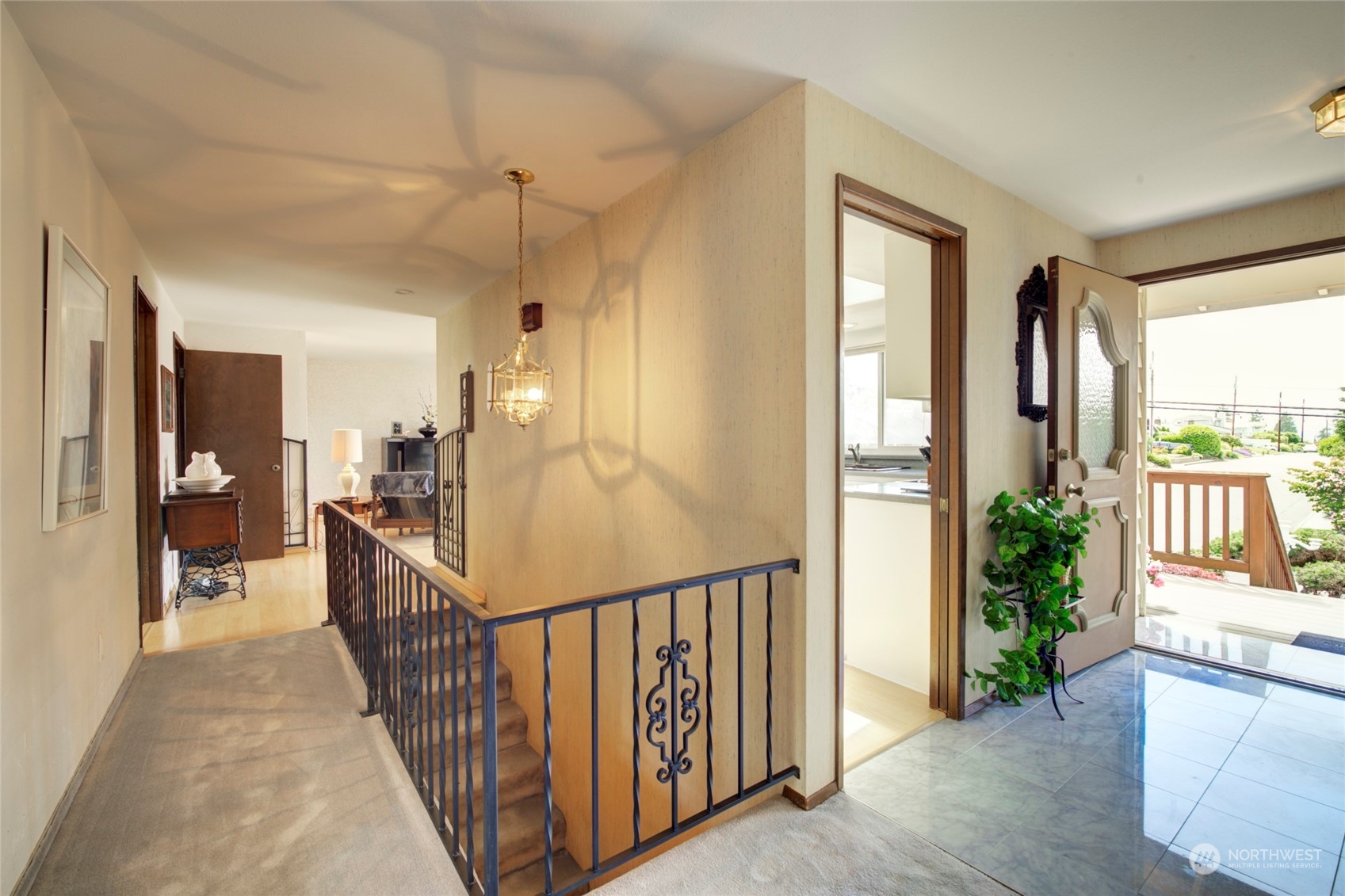432 Olympic Avenue Edmonds, WA 98020 - Photo 5 of 34 a view of a hallway with wooden floor and stairs