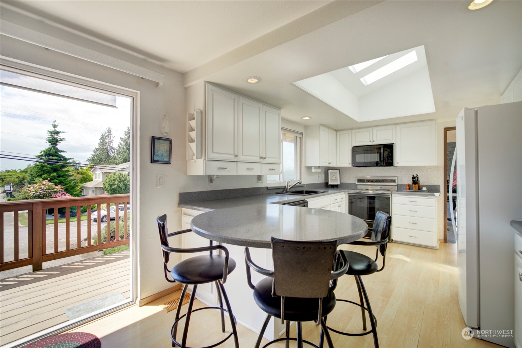 432 Olympic Avenue Edmonds, WA 98020 - Photo 8 of 34 a view of a dining room with furniture and wooden floor