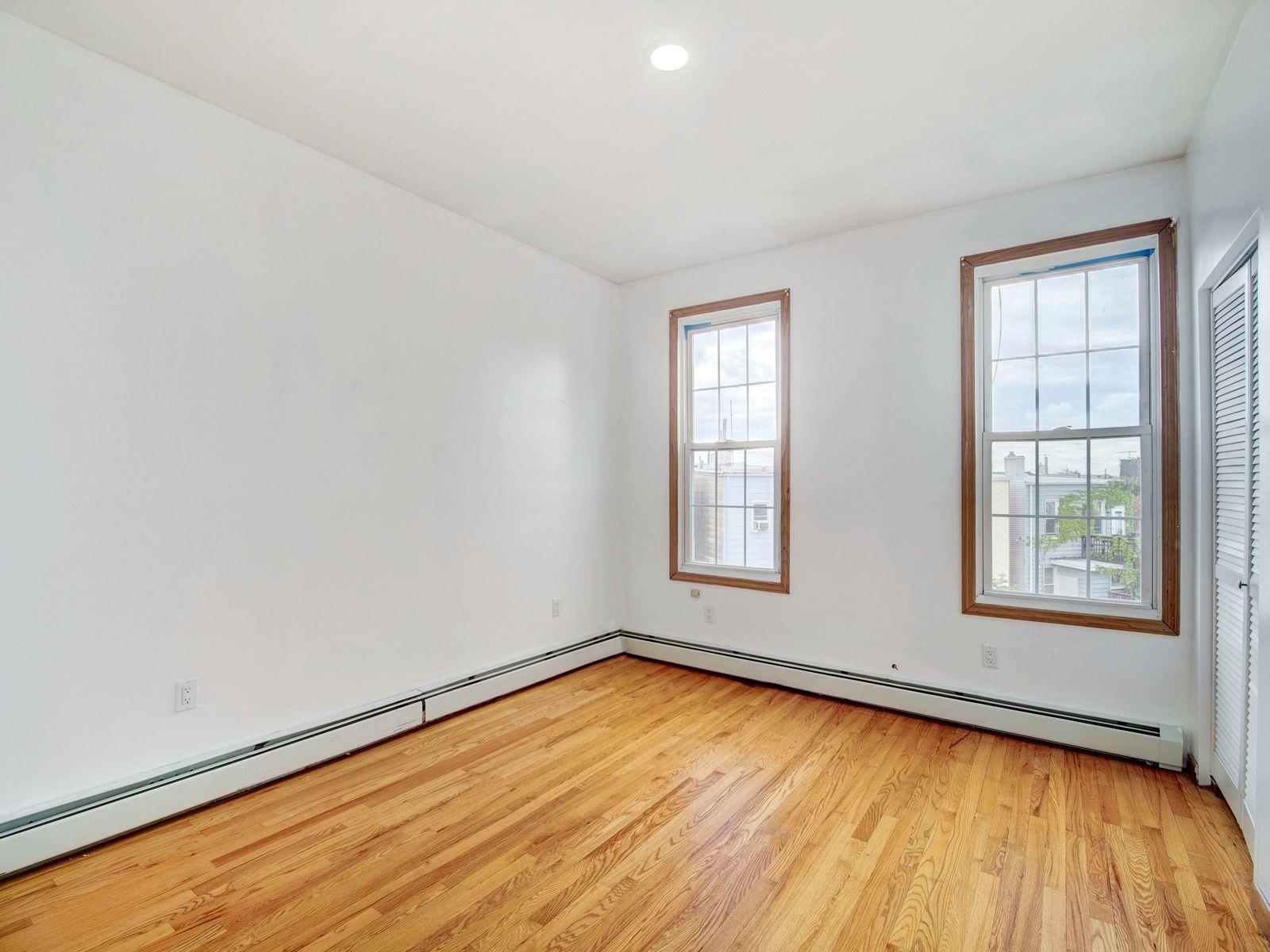 921 Paterson Plank Road, Unit 2 North Bergen, NJ 07047 - Photo 12 of 15 an empty room with a window