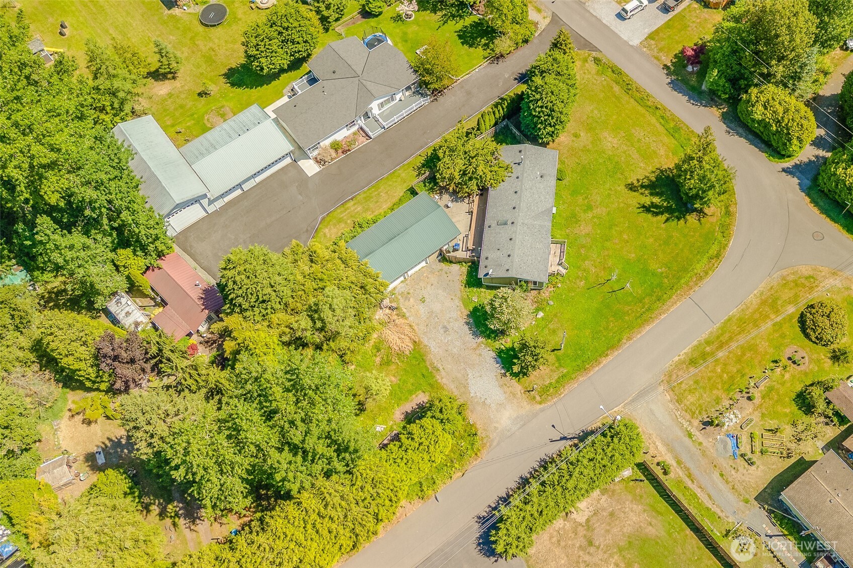 4230 Cody Road Blaine, WA 98230 - Photo 33 of 38 an aerial view of a house with a yard and trees
