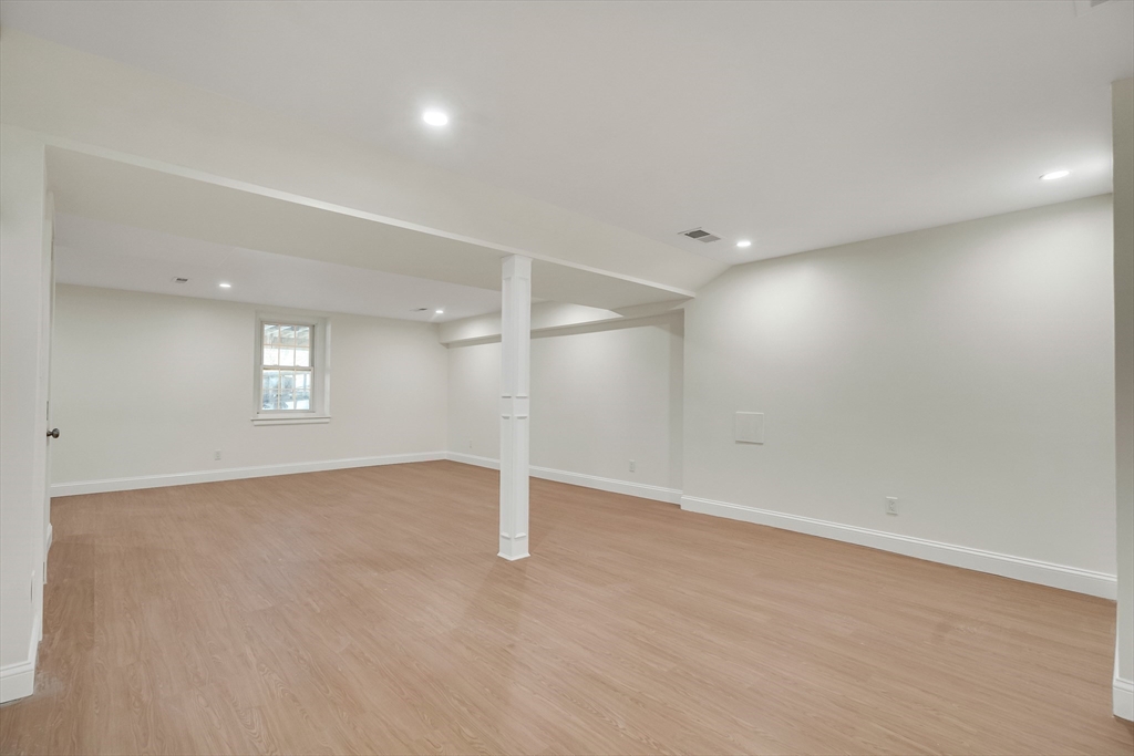510 Common Street Walpole, MA 02081 - Photo 26 of 35 an empty room with a empty space and windows