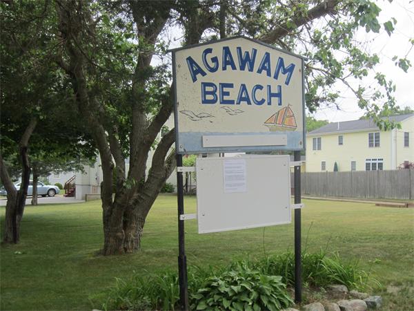 22 Agawam Beach Road Wareham, MA 02571 - Photo 4 of 16 a view of a street sign under a large tree