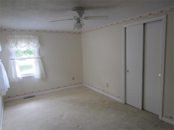 22 Agawam Beach Road Wareham, MA 02571 - Photo 10 of 16 an empty room with a window