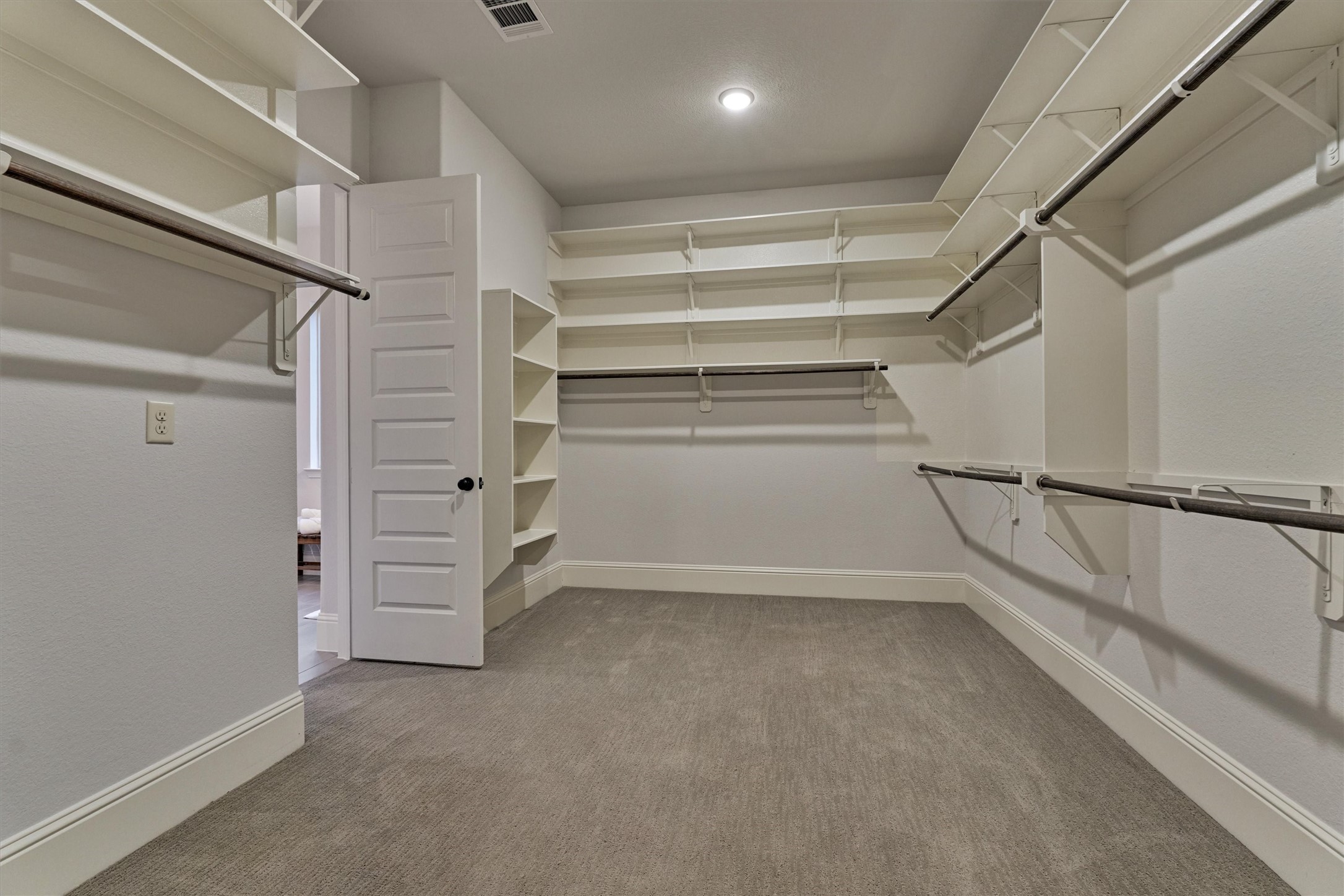 414 Mill Creek Road Pinehurst, TX 77362 - Photo 26 of 43 Primary Closet goes to the Laundry Room