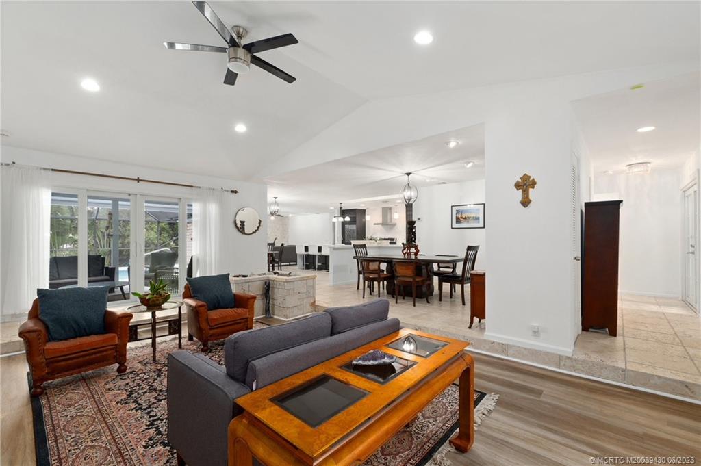 40 North River Road Stuart, FL 34996 - Photo 19 of 51 a living room with furniture and a table