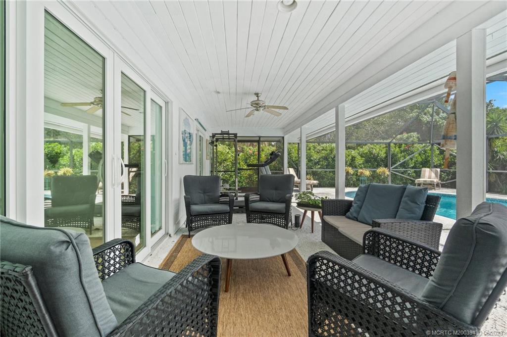 40 North River Road Stuart, FL 34996 - Photo 36 of 51 a living room with furniture and a large window