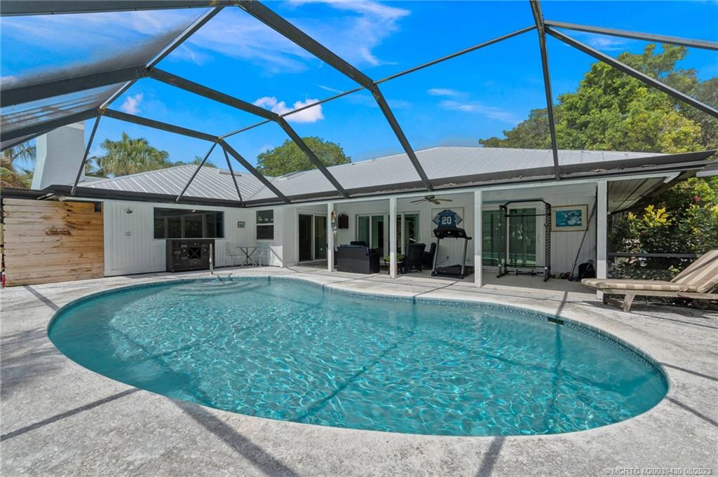 40 North River Road Stuart, FL 34996 - Photo 38 of 51 a view of a house with a backyard