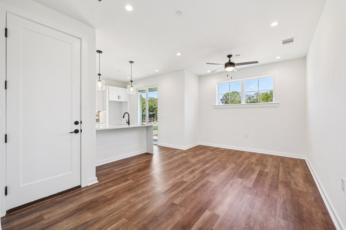 2414 Drew Lane, Unit 3 Austin, TX 78748 - Photo 7 of 38 a view of kitchen with wooden floor and window
