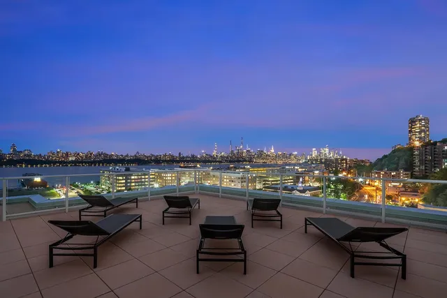 a view of a terrace with outdoor seating