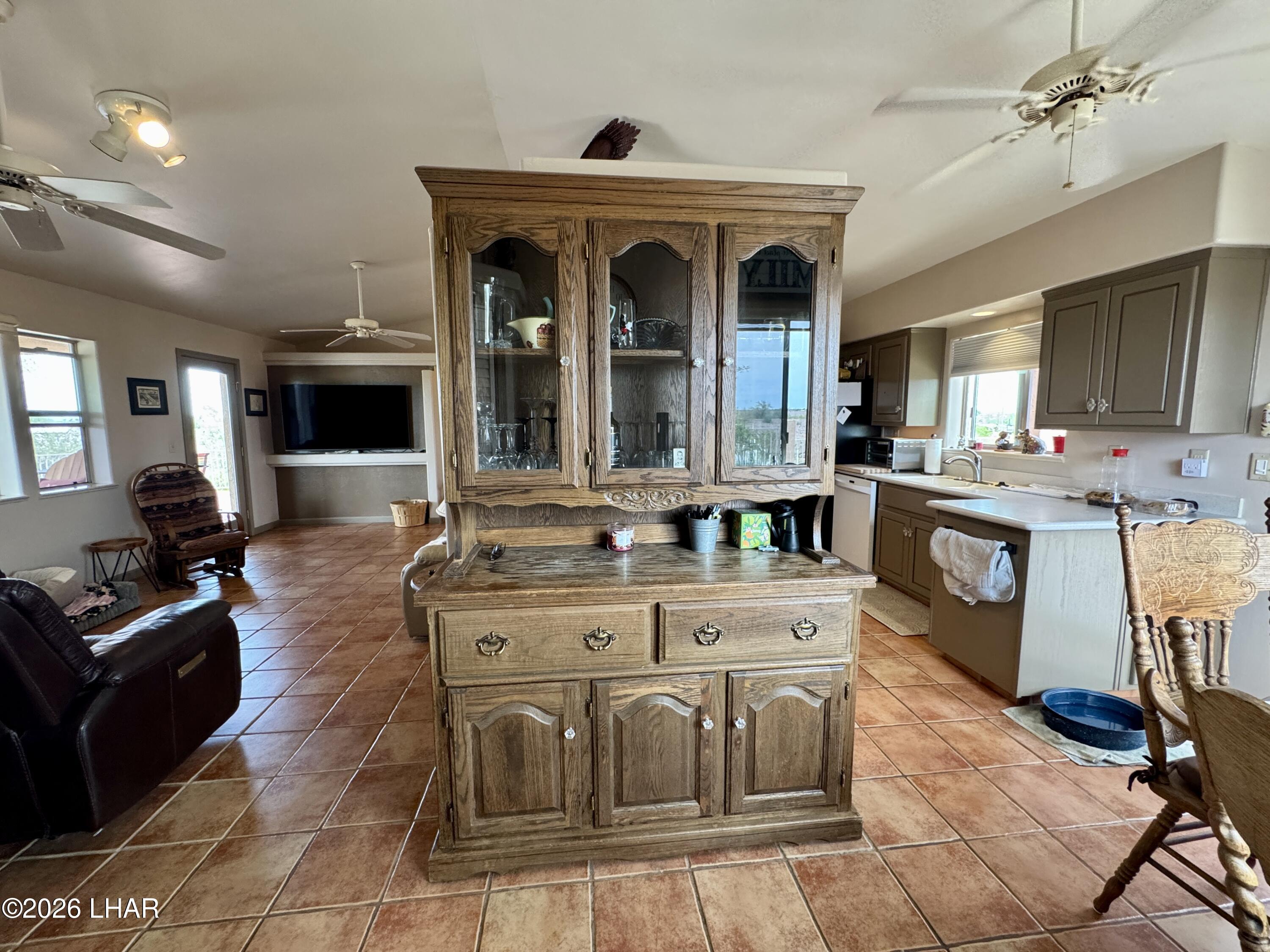42832 La Posa Road Bouse, AZ 85325 - Photo 17 of 62 a large kitchen with stainless steel appliances granite countertop a stove and cabinets