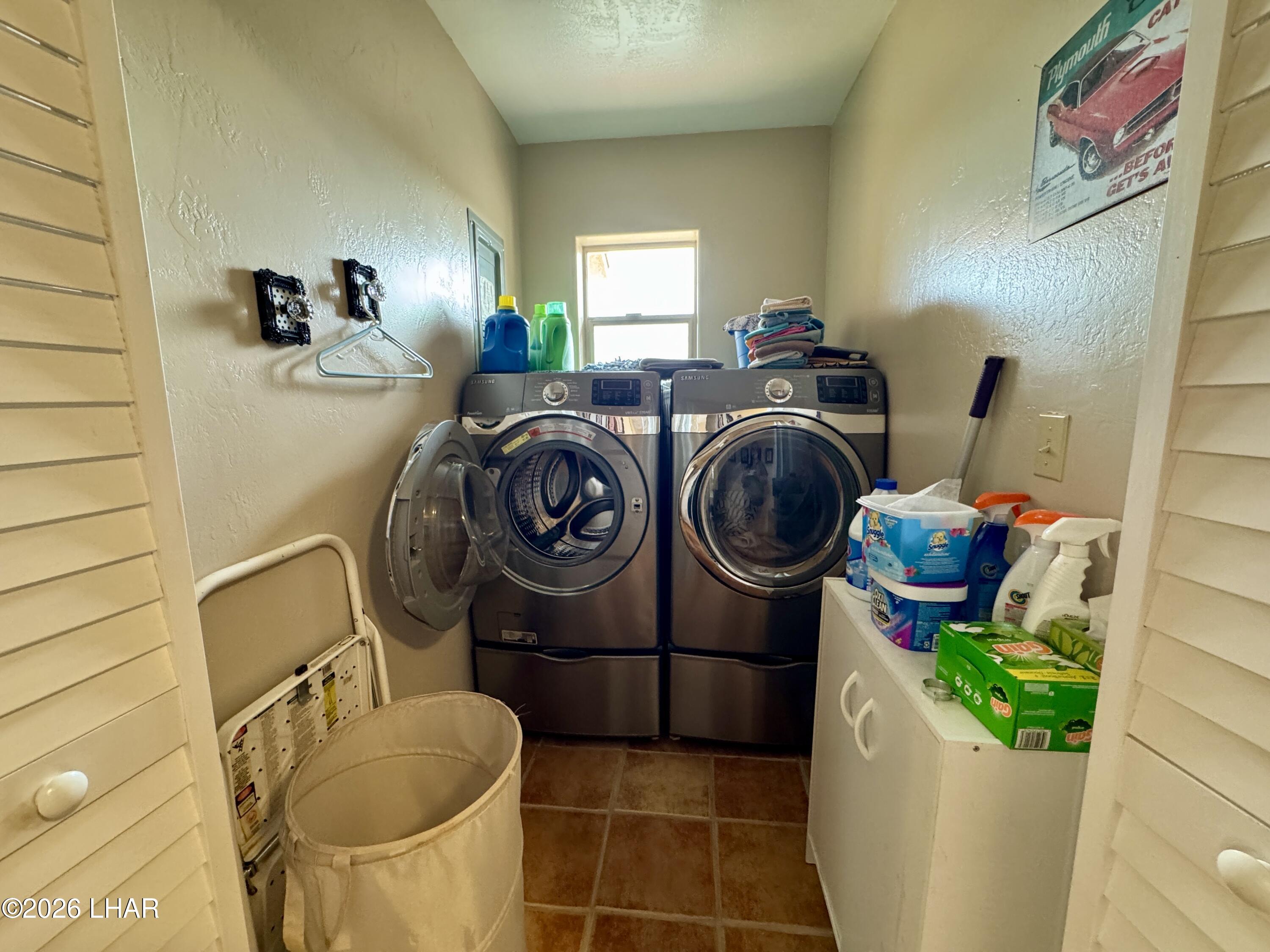 42832 La Posa Road Bouse, AZ 85325 - Photo 25 of 62 a utility room with sink dryer and washer
