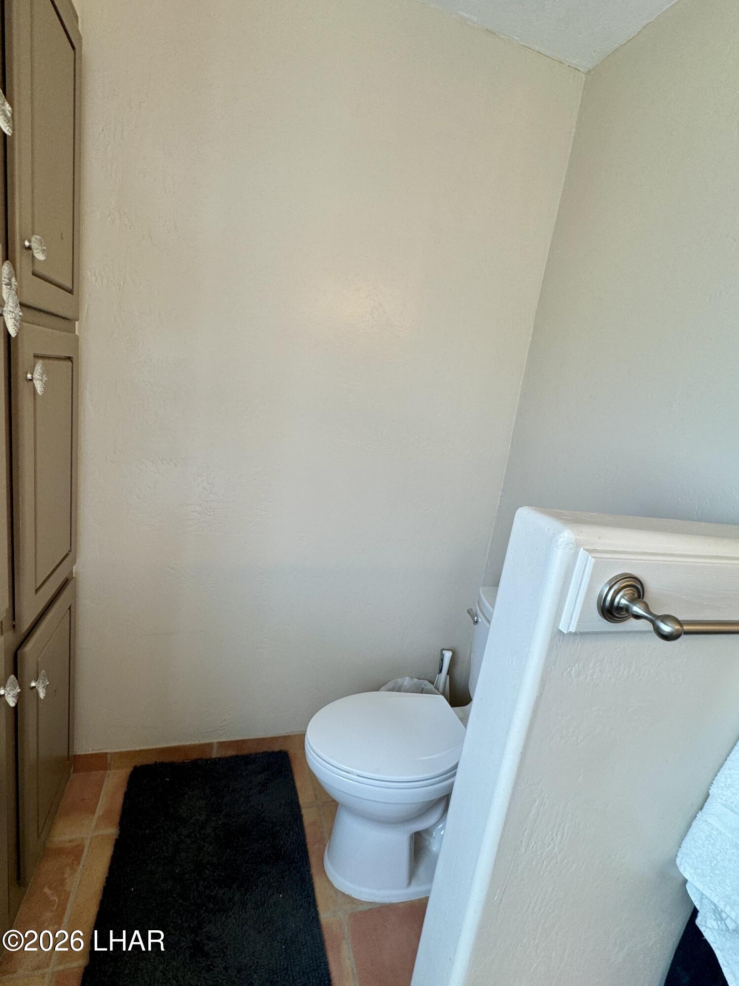 42832 La Posa Road Bouse, AZ 85325 - Photo 34 of 62 a white toilet sitting next to a sink