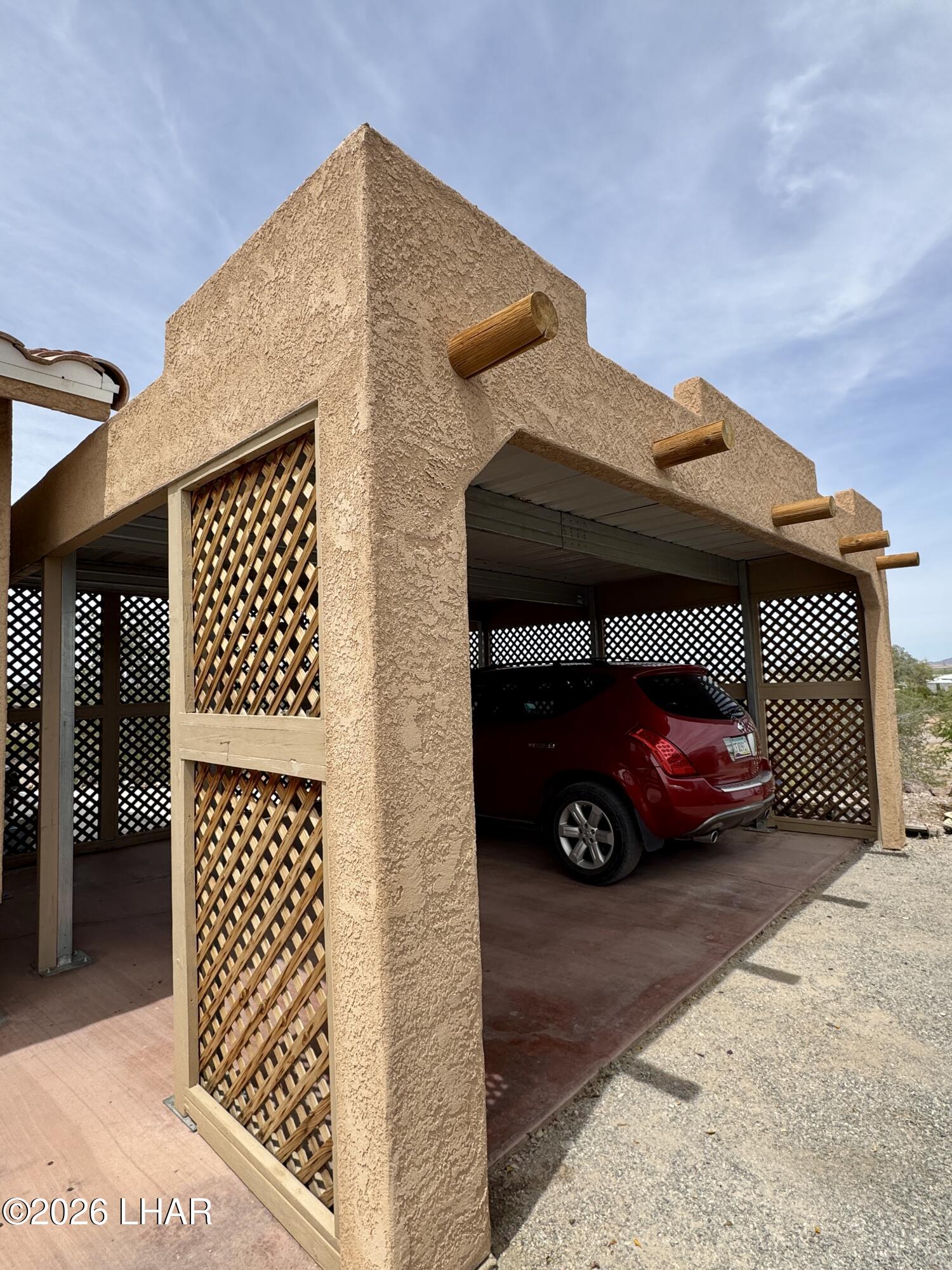 42832 La Posa Road Bouse, AZ 85325 - Photo 50 of 62 a car parked in front of a house