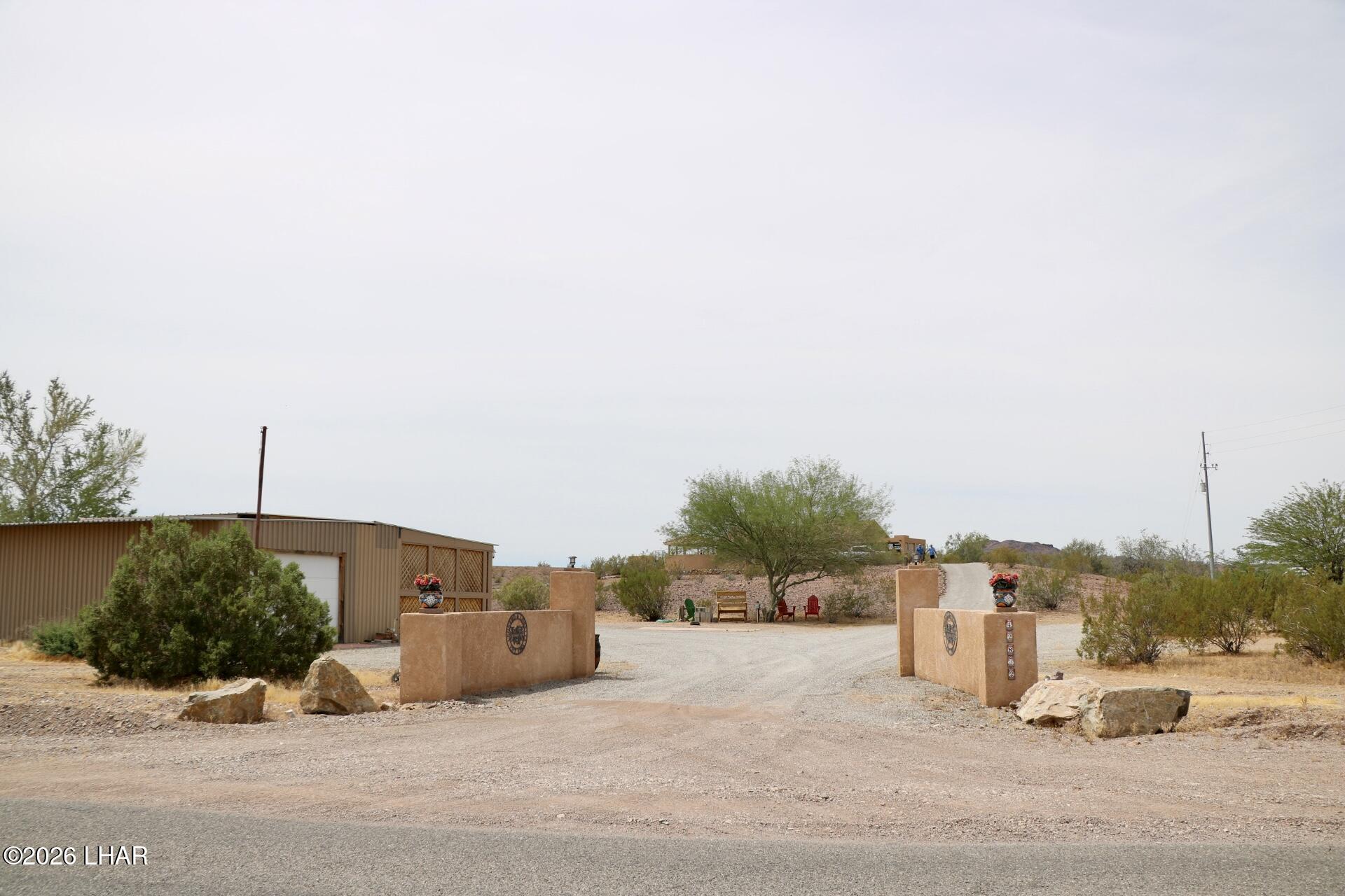 42832 La Posa Road Bouse, AZ 85325 - Photo 5 of 62 a view of a house with a yard