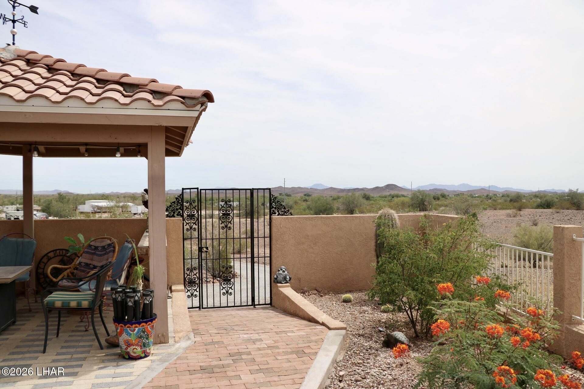 42832 La Posa Road Bouse, AZ 85325 - Photo 52 of 62 a terrace with outdoor seating and city view