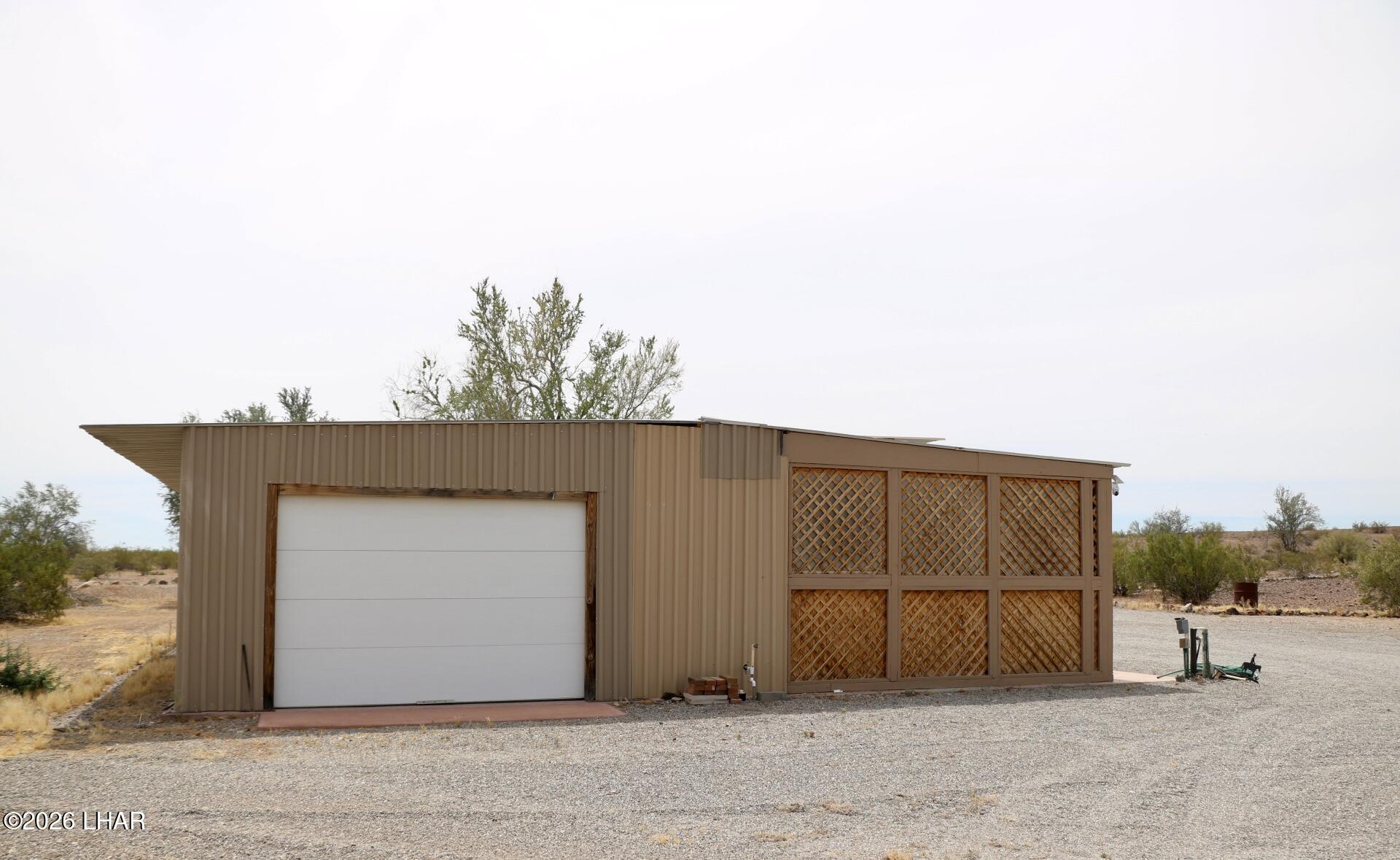 42832 La Posa Road Bouse, AZ 85325 - Photo 57 of 62 a view of a house with a garage