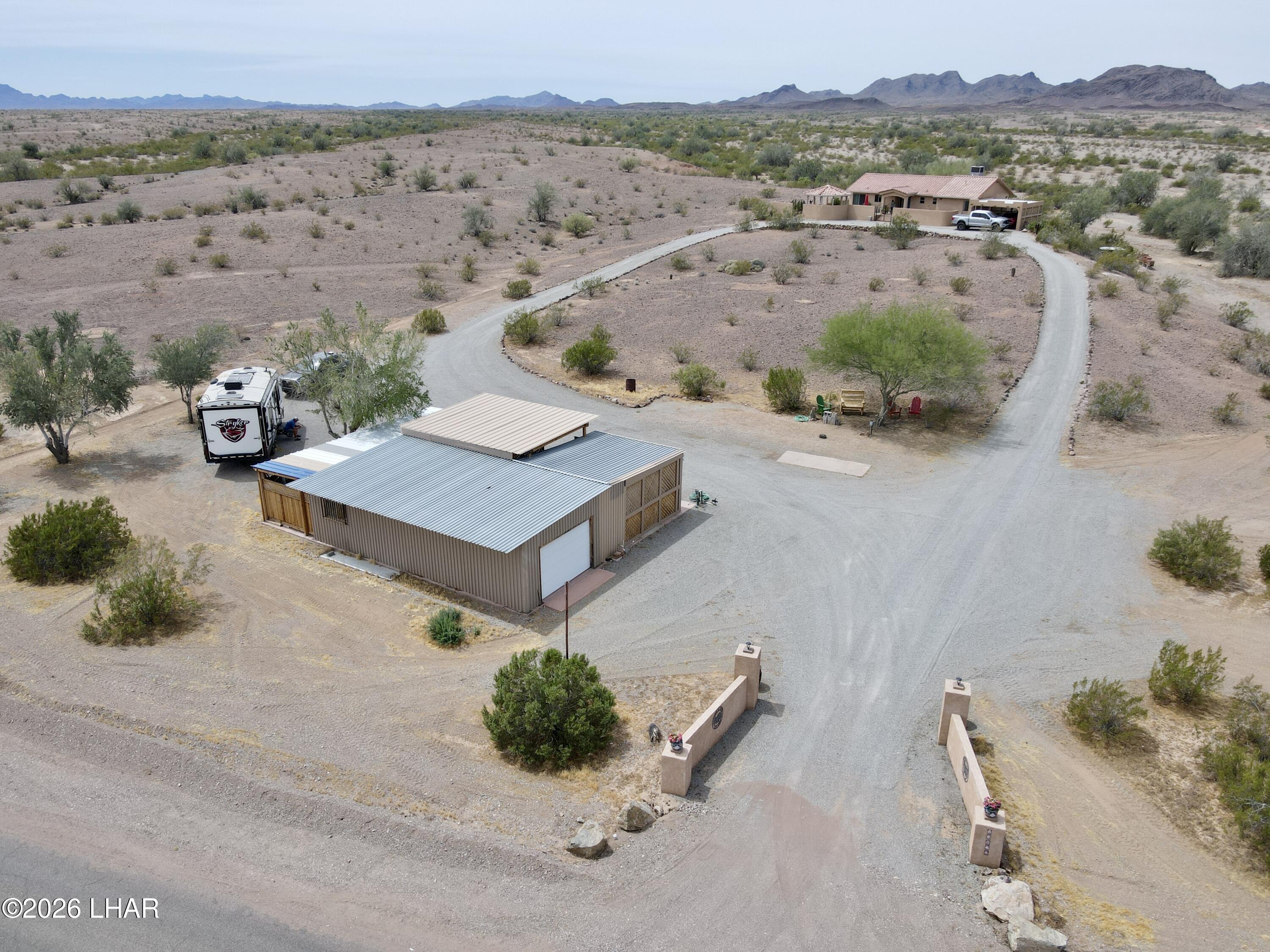 42832 La Posa Road Bouse, AZ 85325 - Photo 58 of 62 an aerial view of a house with a yard