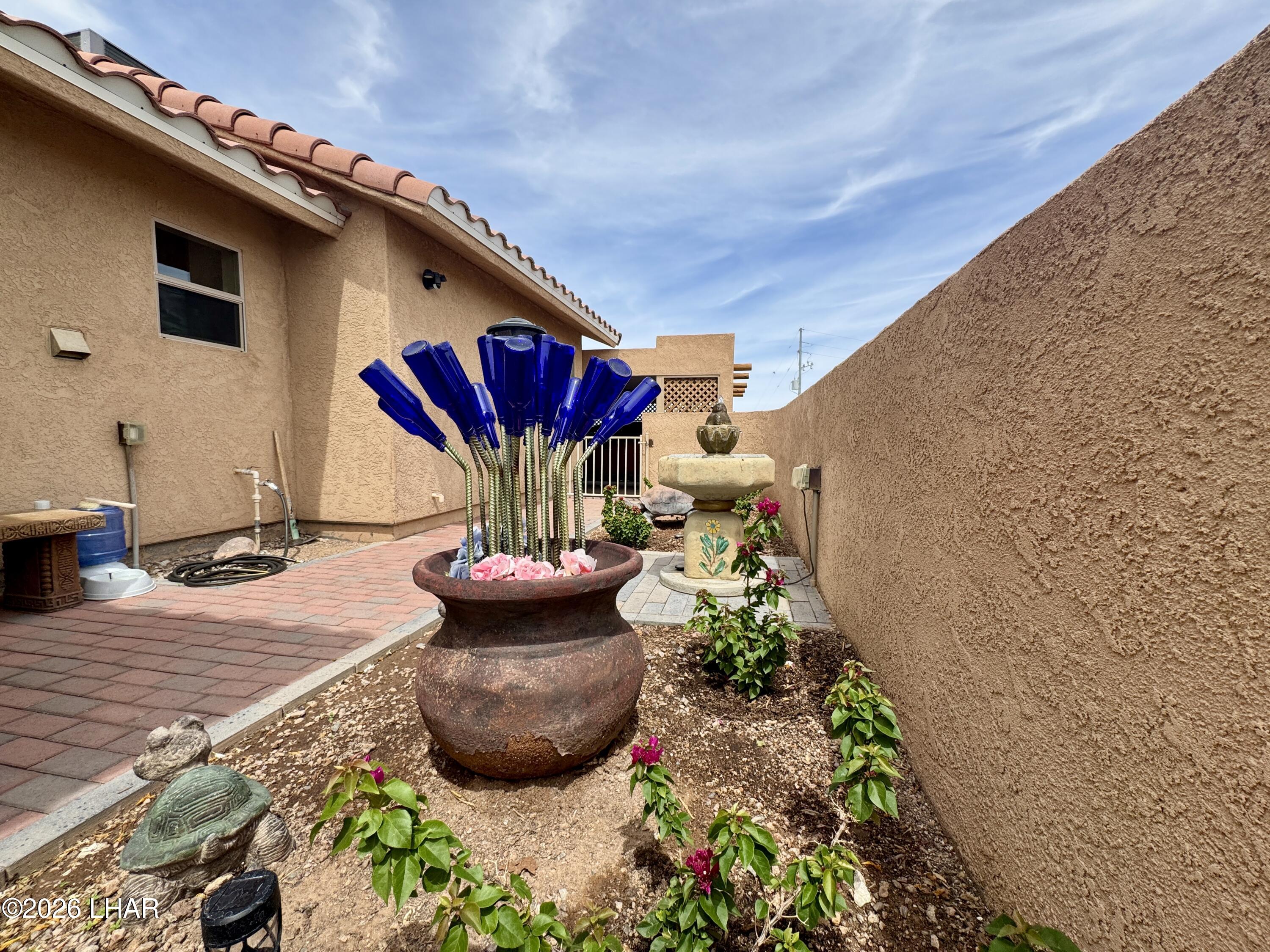 42832 La Posa Road Bouse, AZ 85325 - Photo 8 of 62 a front view of a house with patio