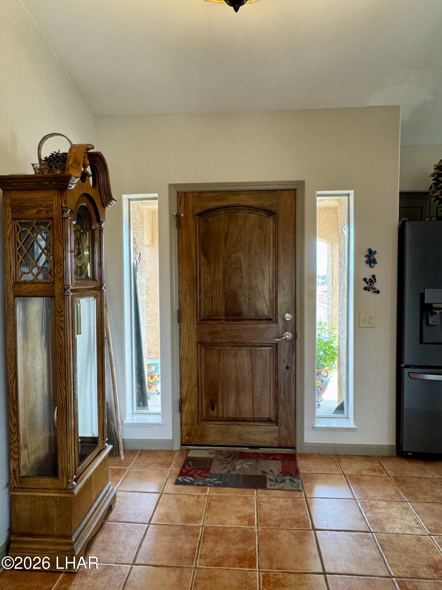 42832 La Posa Road Bouse, AZ 85325 - Photo 9 of 62 a view of a entryway door with couch