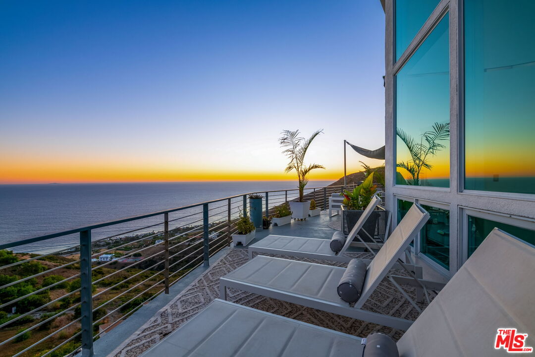 31518 Anacapa View Drive Malibu, CA 90265 - Photo 13 of 75 a view of a balcony with chairs