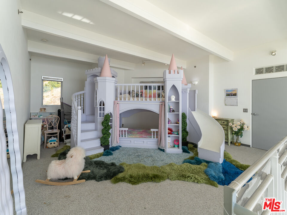 31518 Anacapa View Drive Malibu, CA 90265 - Photo 27 of 75 a living room with furniture and a fireplace