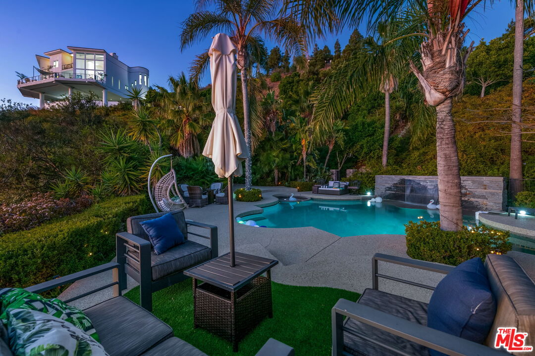 31518 Anacapa View Drive Malibu, CA 90265 - Photo 52 of 75 a view of a garden with sitting area