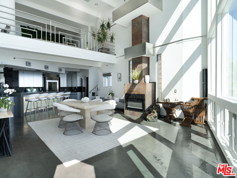 31518 Anacapa View Drive Malibu, CA 90265 - Photo 8 of 75 a living room with couches a coffee table and next to a window