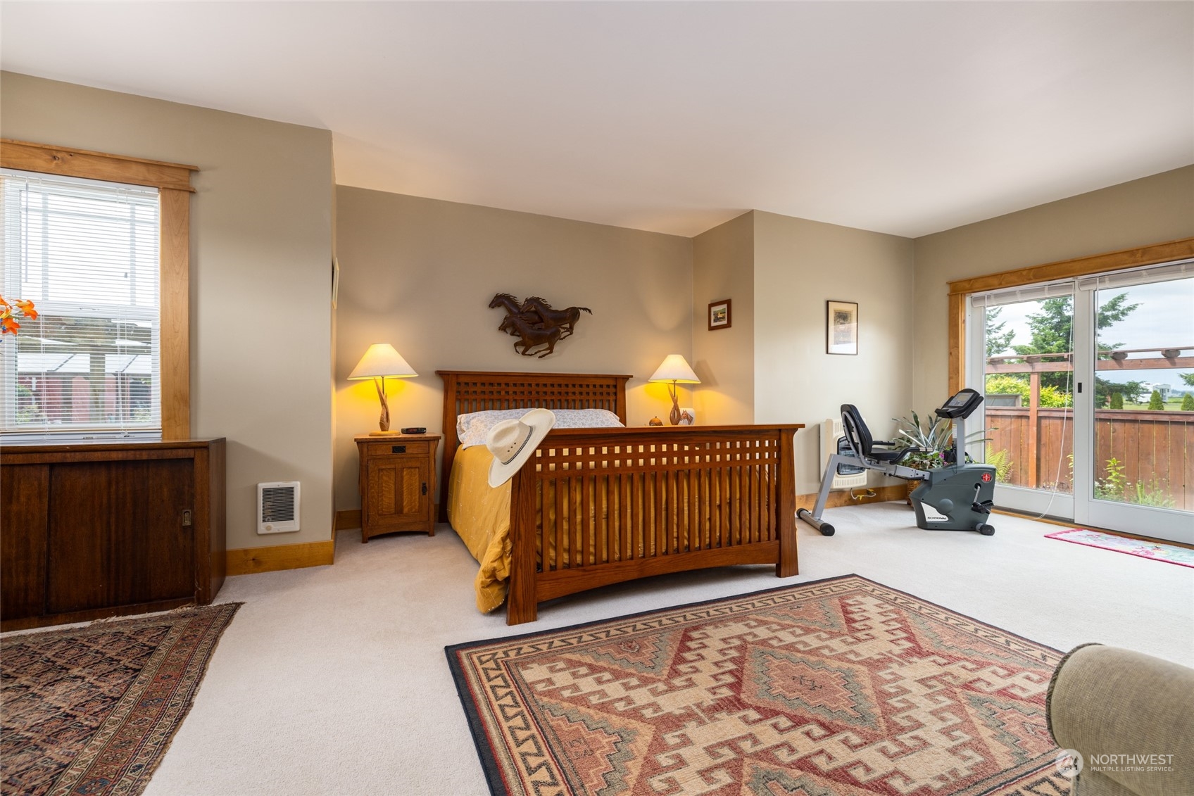 16244 Field Road Bow, WA 98232 - Photo 15 of 40 a bedroom with furniture and a window
