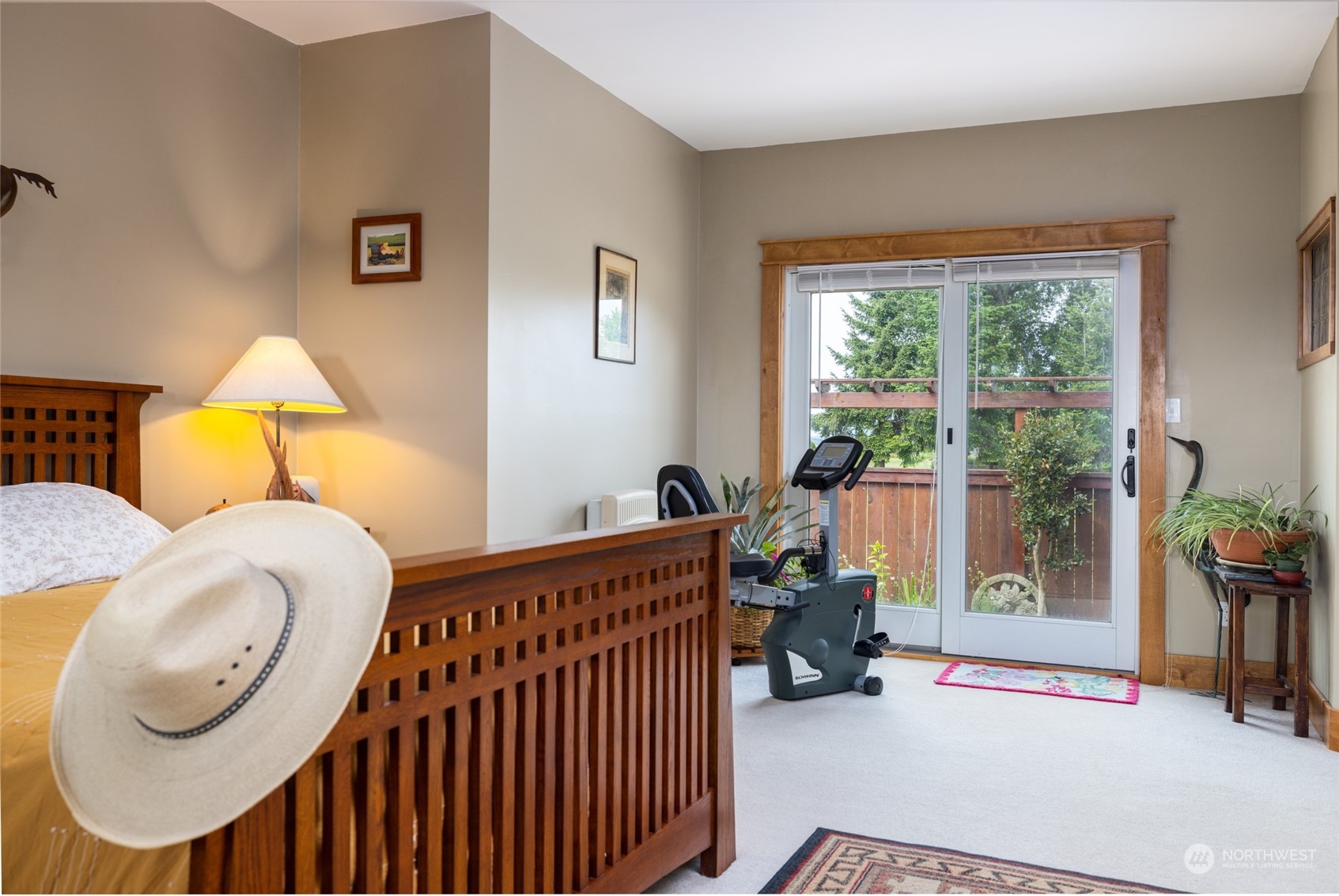 16244 Field Road Bow, WA 98232 - Photo 16 of 40 a bedroom with furniture and a large window