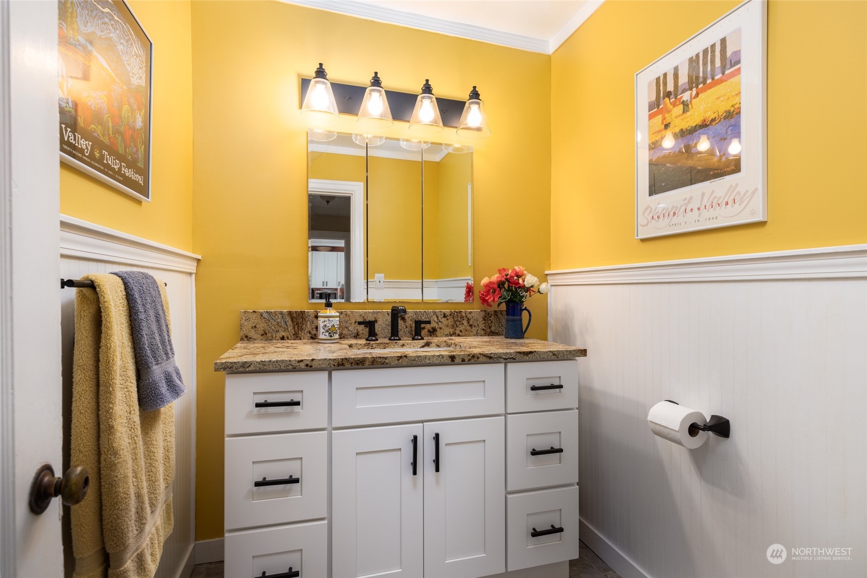 16244 Field Road Bow, WA 98232 - Photo 19 of 40 a bathroom with a granite countertop sink and a mirror