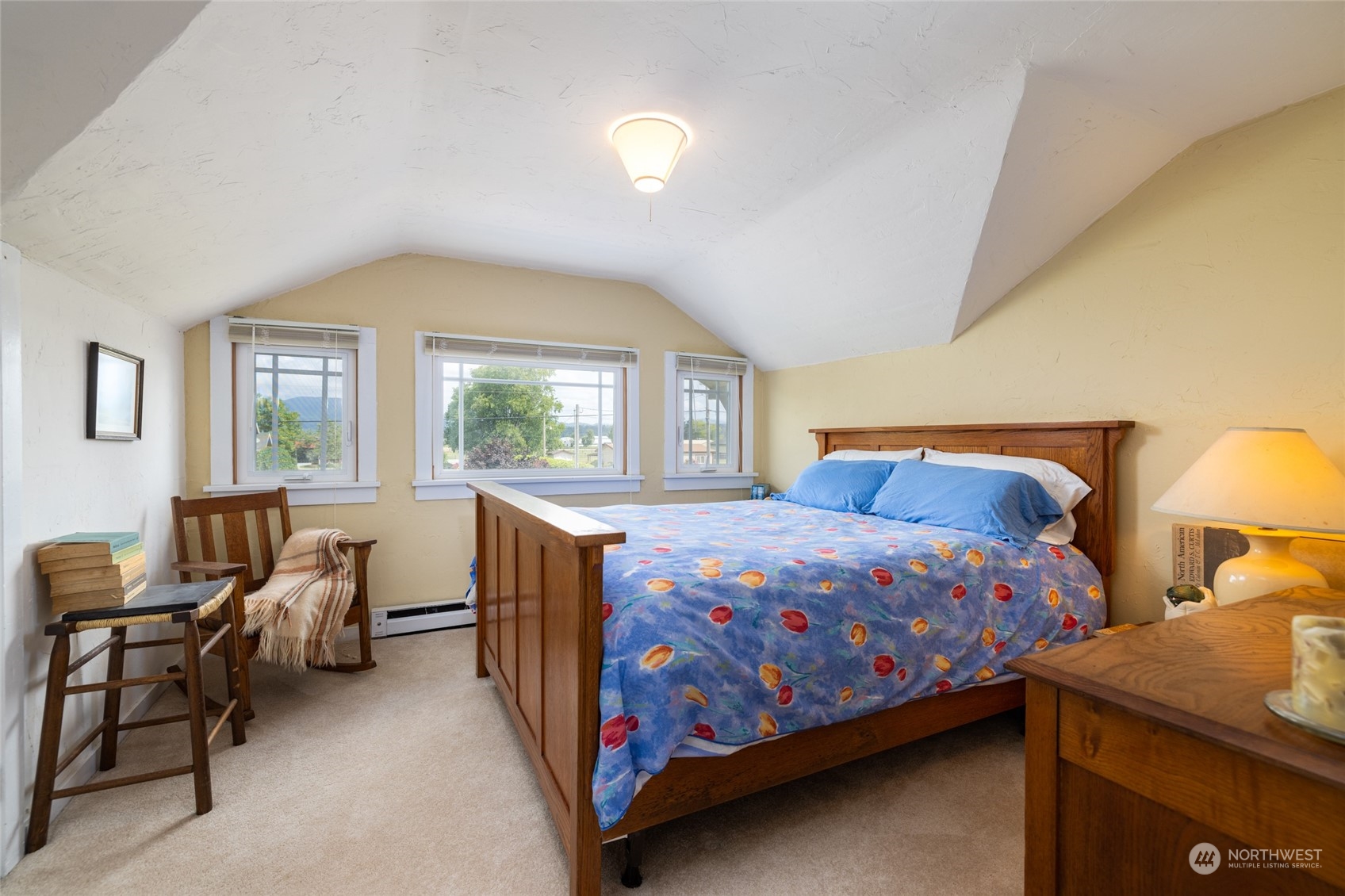 16244 Field Road Bow, WA 98232 - Photo 23 of 40 a bedroom with a bed and a larger window