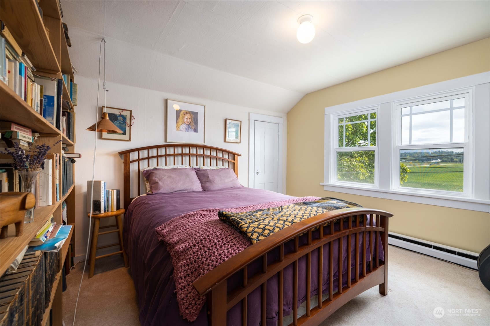 16244 Field Road Bow, WA 98232 - Photo 24 of 40 a bedroom with a bed and a window