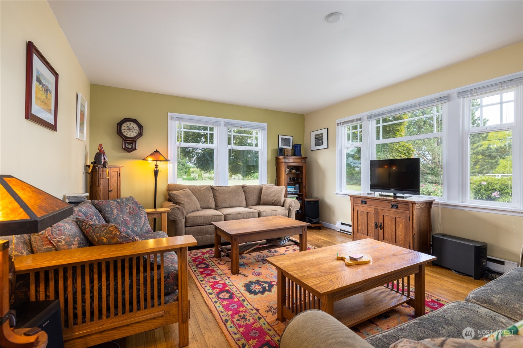 16244 Field Road Bow, WA 98232 - Photo 7 of 40 a living room with furniture and a flat screen tv