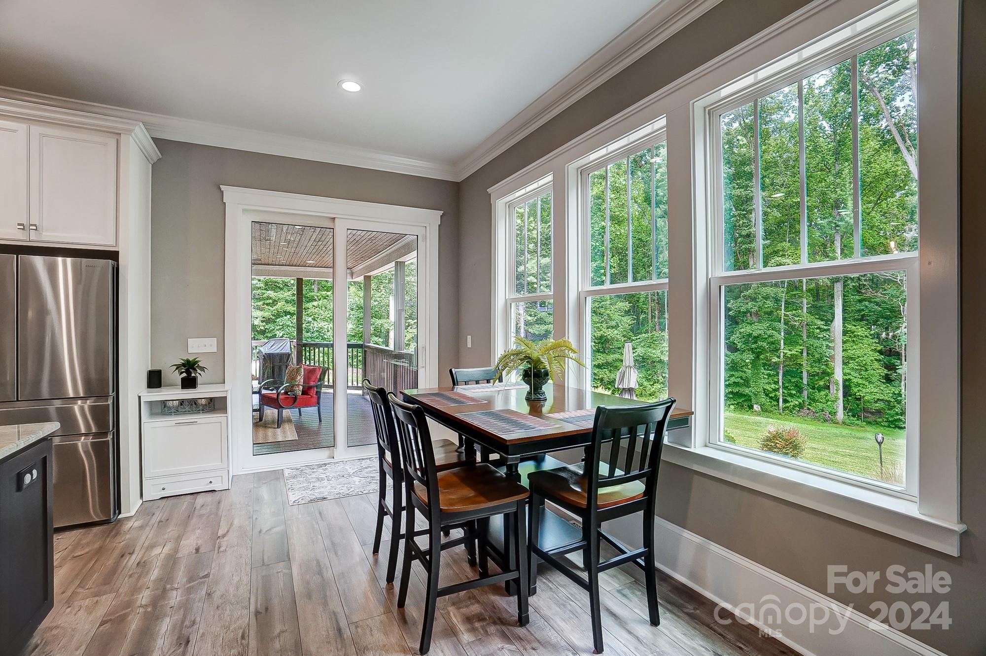 1123 Blacksnake Road Stanley, NC 28164 - Photo 14 of 48 a view of a dining room with furniture and a window