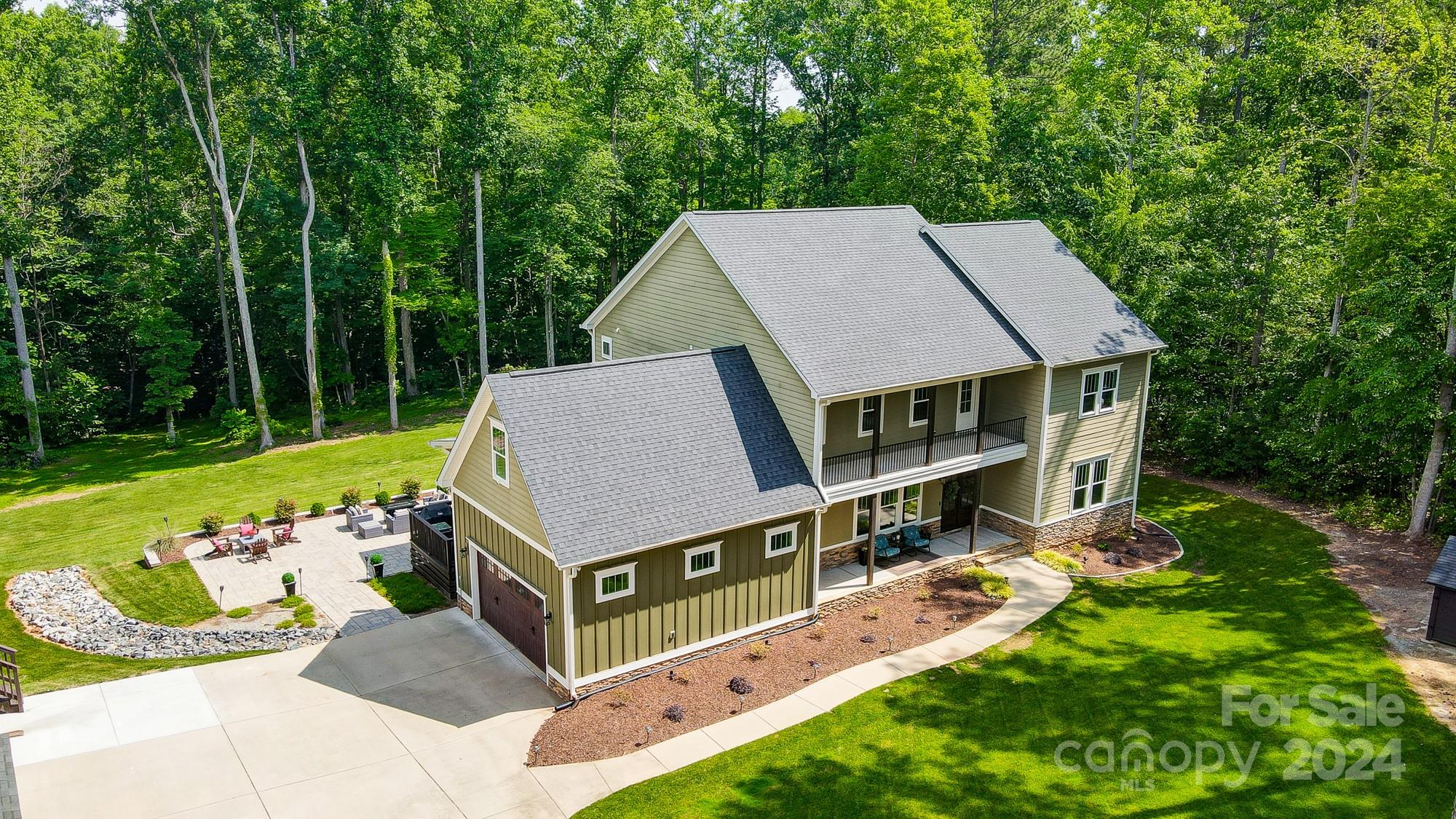 1123 Blacksnake Road Stanley, NC 28164 - Photo 2 of 48 an aerial view of a house with swimming pool garden and patio