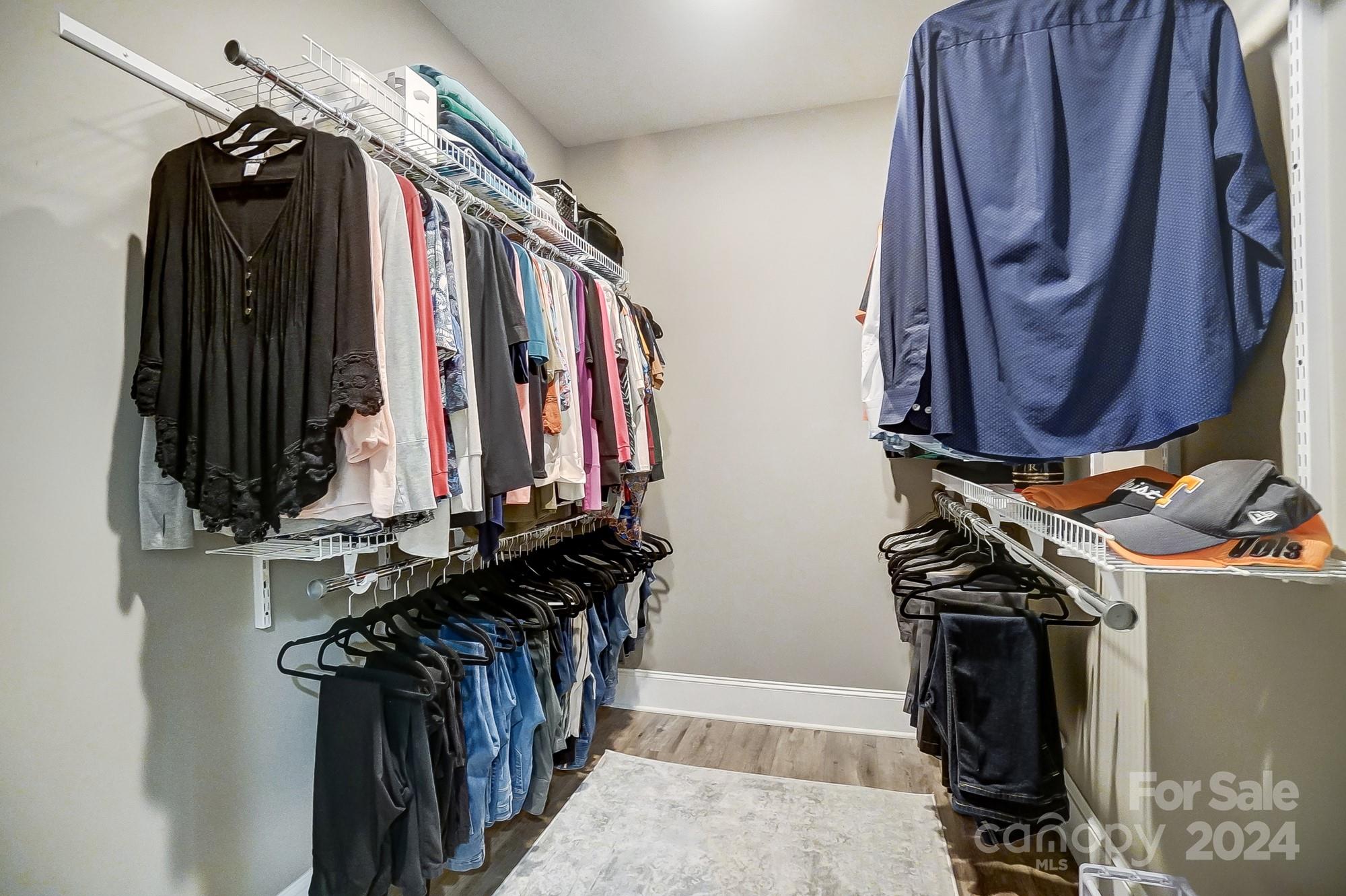 1123 Blacksnake Road Stanley, NC 28164 - Photo 26 of 48 a view of walk in closet with clothes