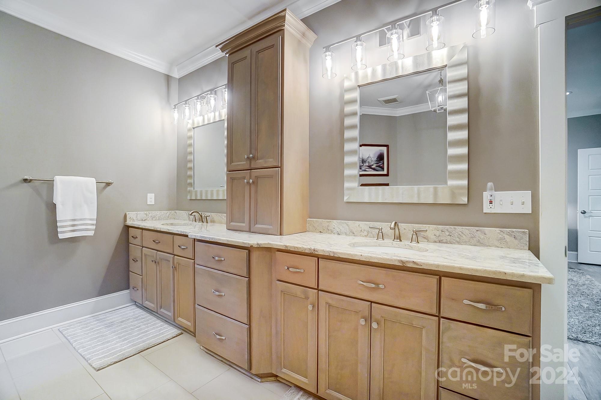 1123 Blacksnake Road Stanley, NC 28164 - Photo 29 of 48 a bathroom with a granite countertop sink mirror and double