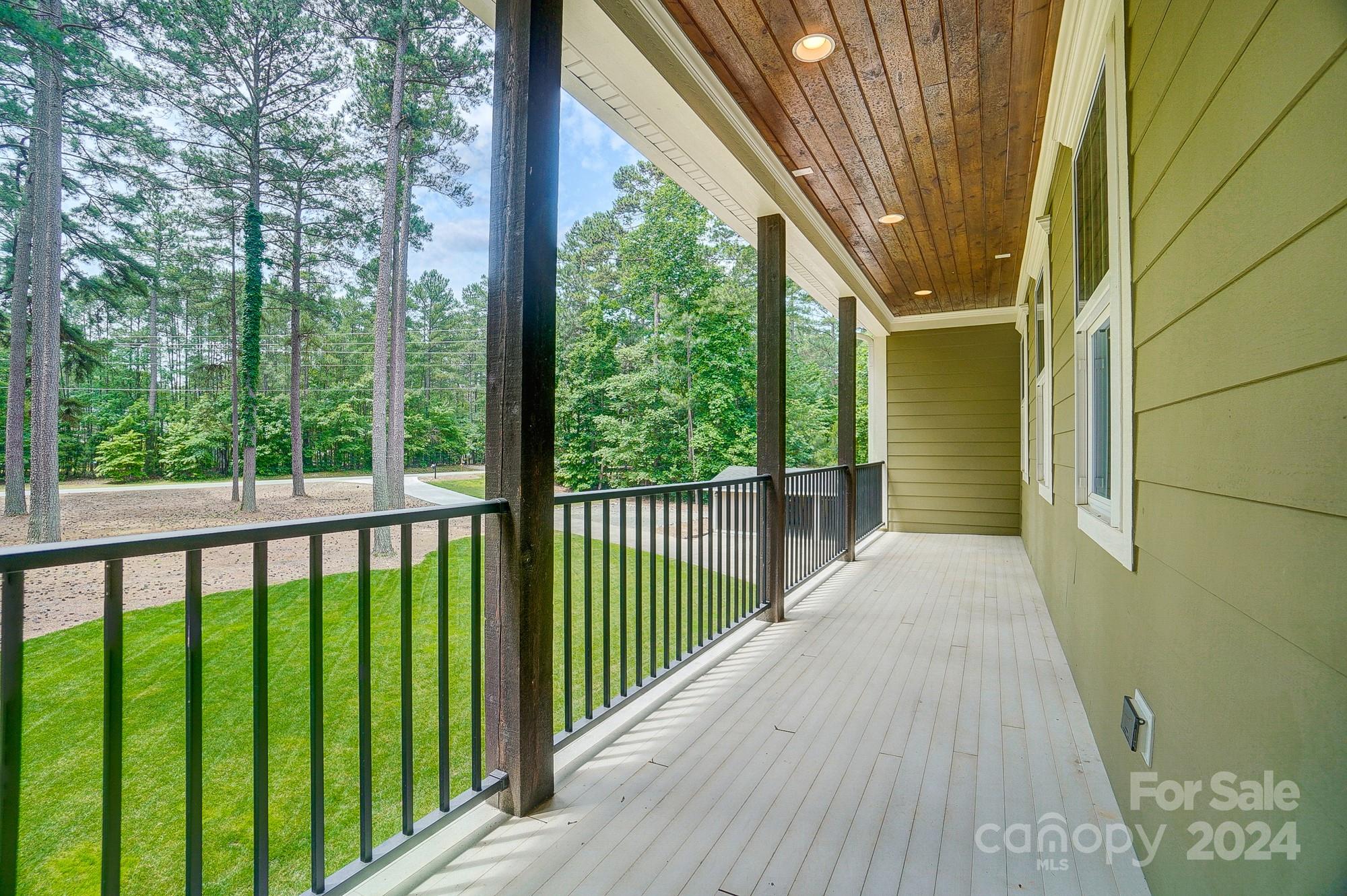 1123 Blacksnake Road Stanley, NC 28164 - Photo 39 of 48 a view of balcony with wooden floor