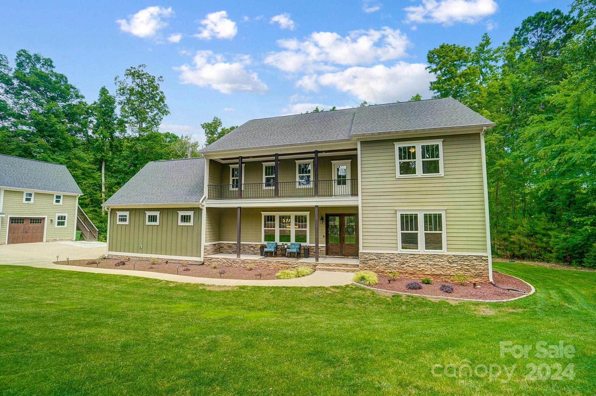 1123 Blacksnake Road Stanley, NC 28164 - Photo 4 of 48 a front view of a house with a yard