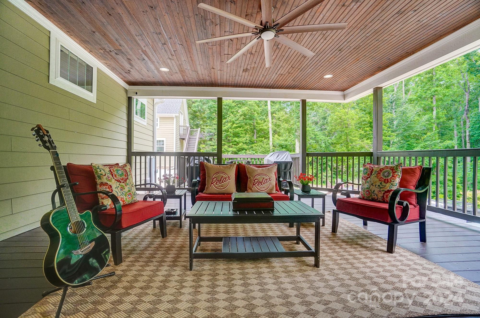 1123 Blacksnake Road Stanley, NC 28164 - Photo 47 of 48 a outdoor living space with furniture and garden view