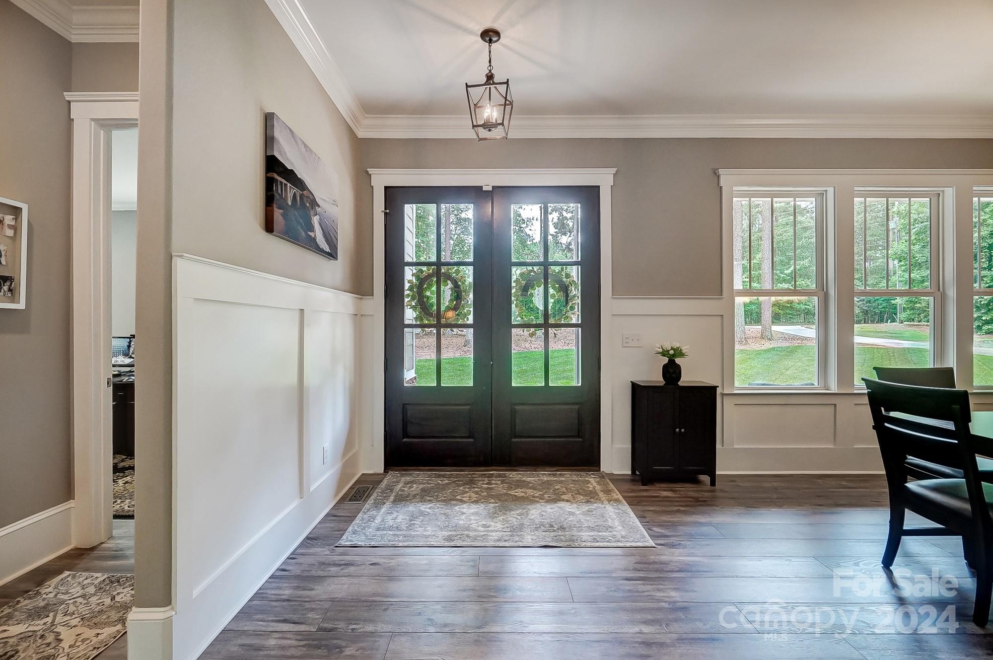 1123 Blacksnake Road Stanley, NC 28164 - Photo 7 of 48 a view of a livingroom with furniture window and wooden floor
