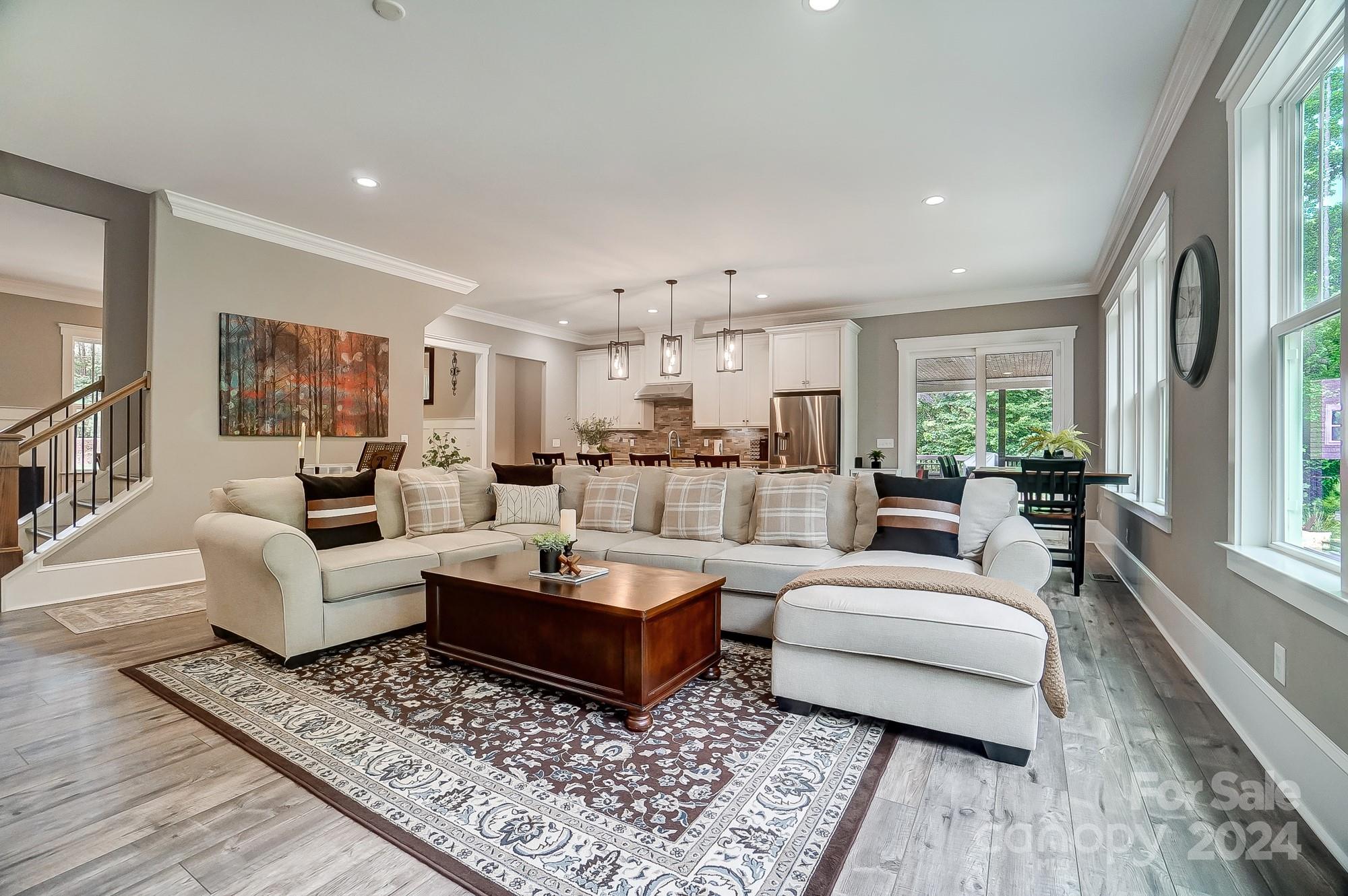 1123 Blacksnake Road Stanley, NC 28164 - Photo 9 of 48 a living room with furniture and a rug