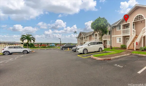 a view of a street with cars