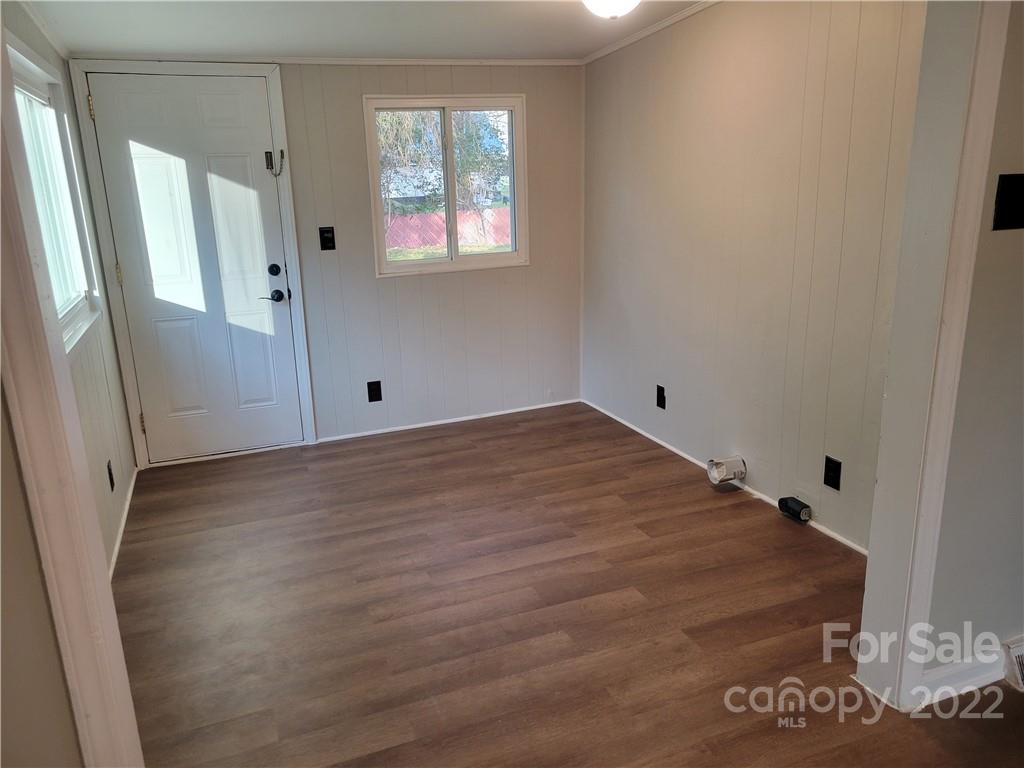943 Tilden Road Charlotte, NC 28214 - Photo 6 of 14 an empty room with windows