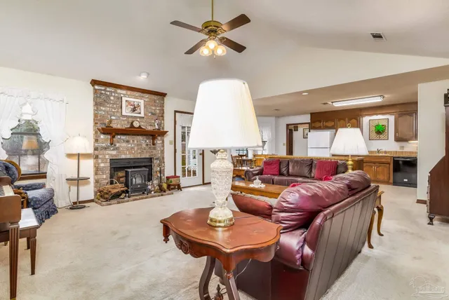 a room with furniture and a book shelf