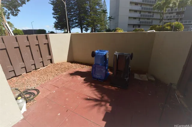 a view of balcony with furniture