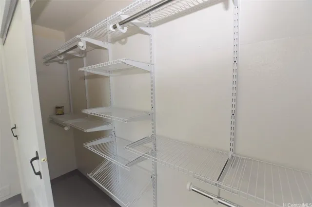 a bathroom with a sink and shower